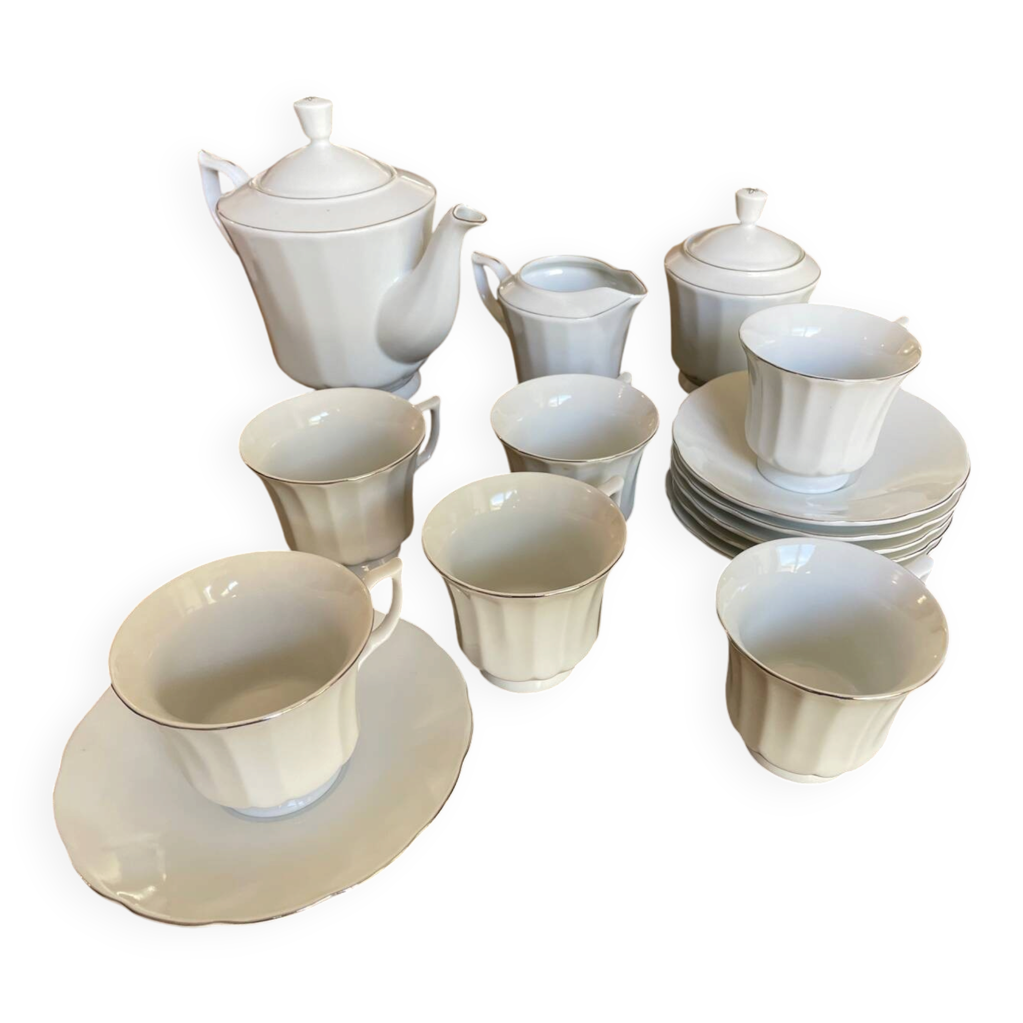 Coffee service for 6 cups, coffee pot, sugar bowl, and milk jug.