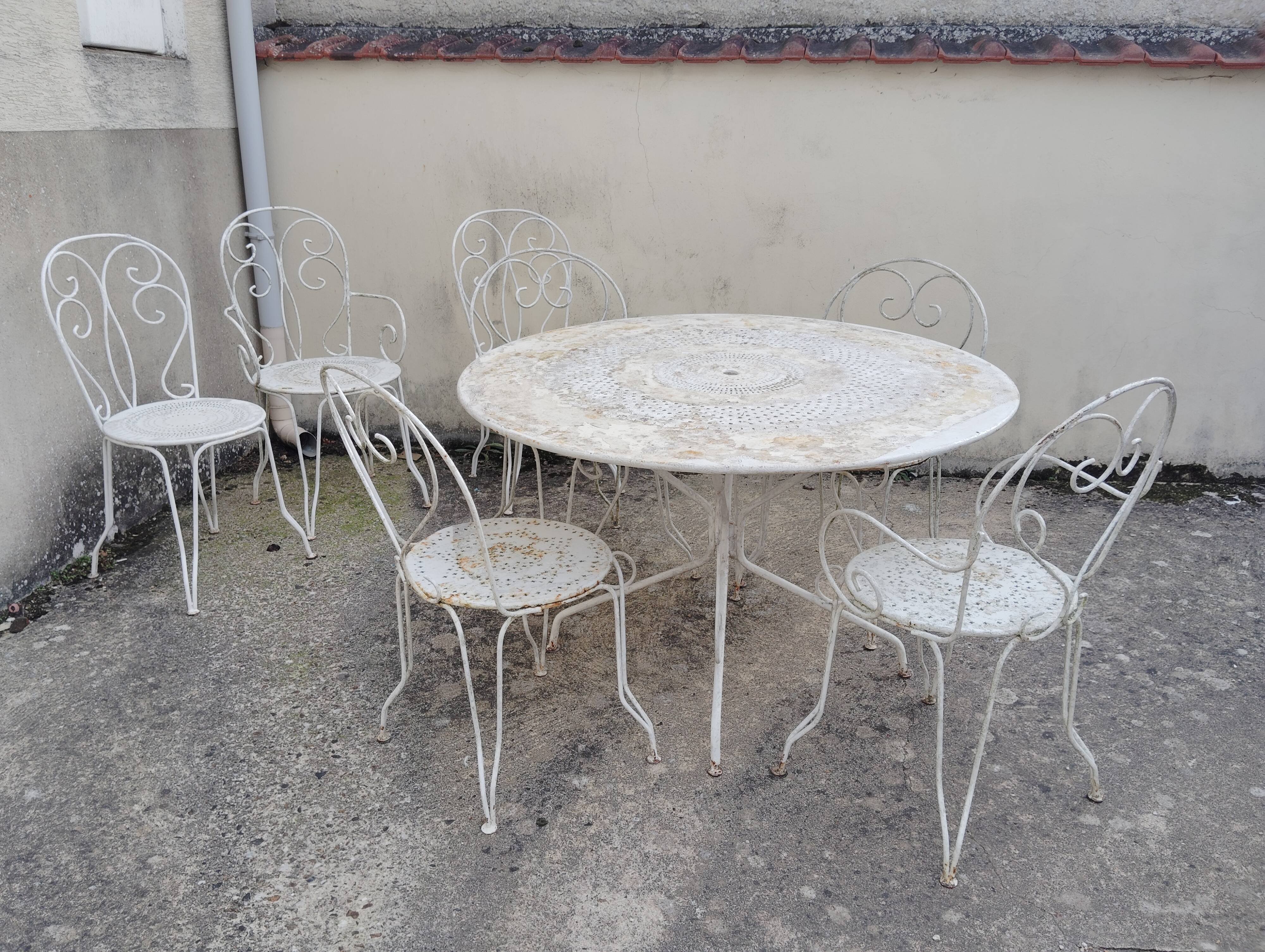 Wrought iron garden furniture from the early 20th century.