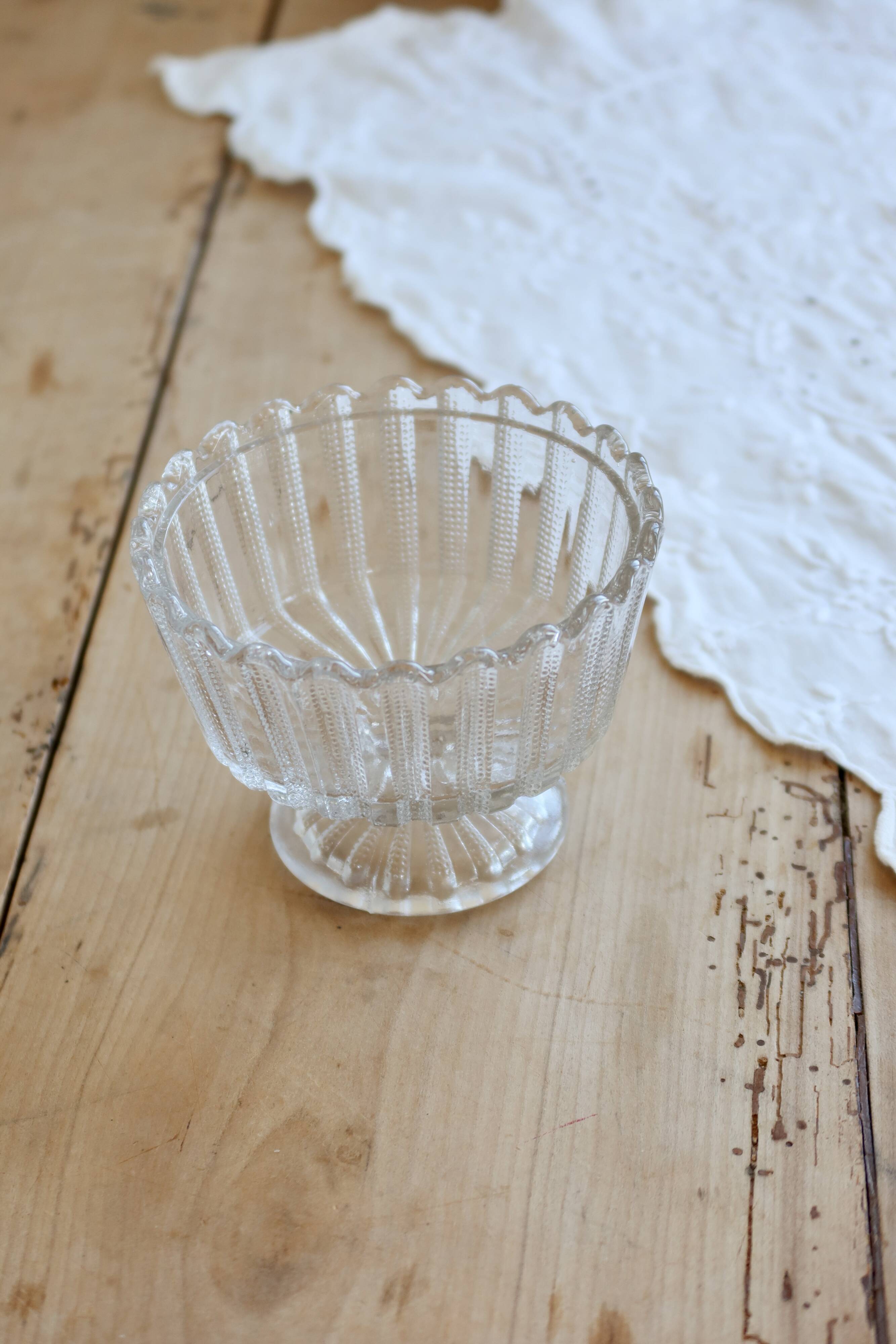 Vintage glass bowl on a pedestal