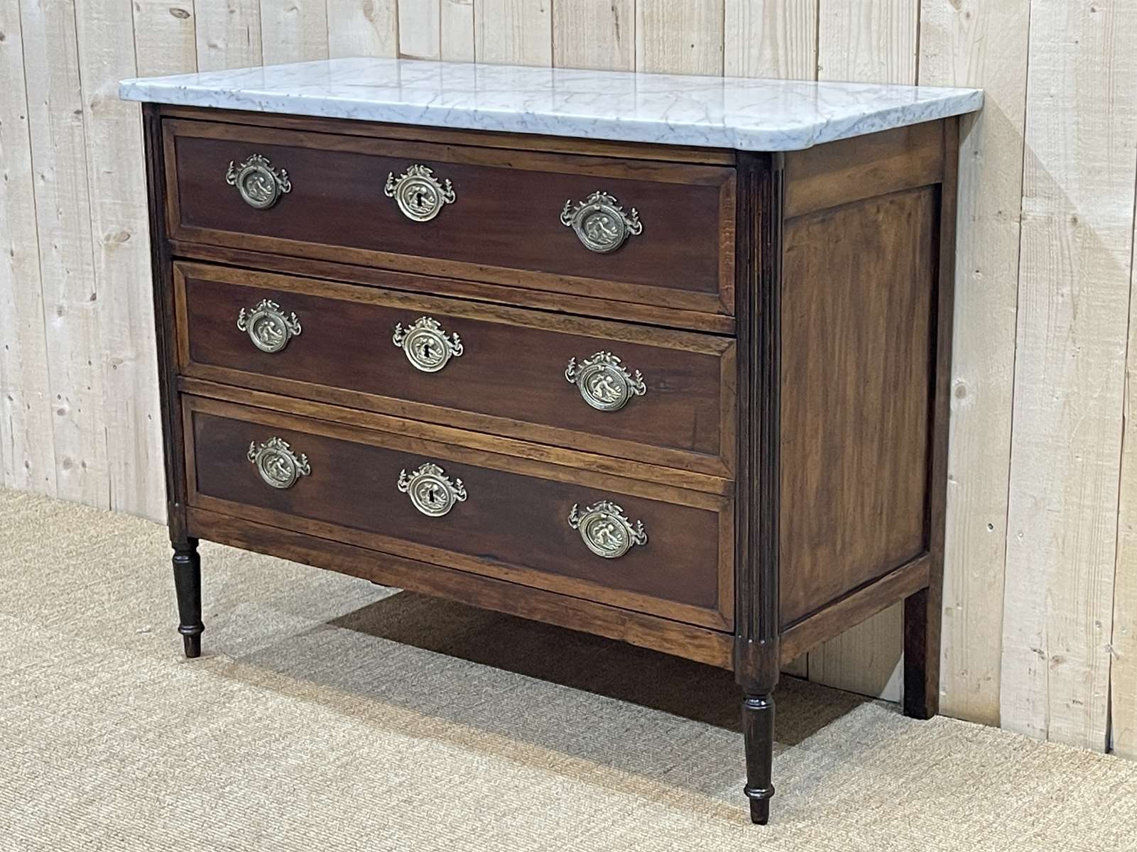 Louis XVI XIXth chest of drawers in mahogany and walnut and white marble top