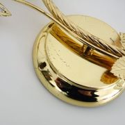 Pair of vintage floral wall sconces in gold metal and tassel
