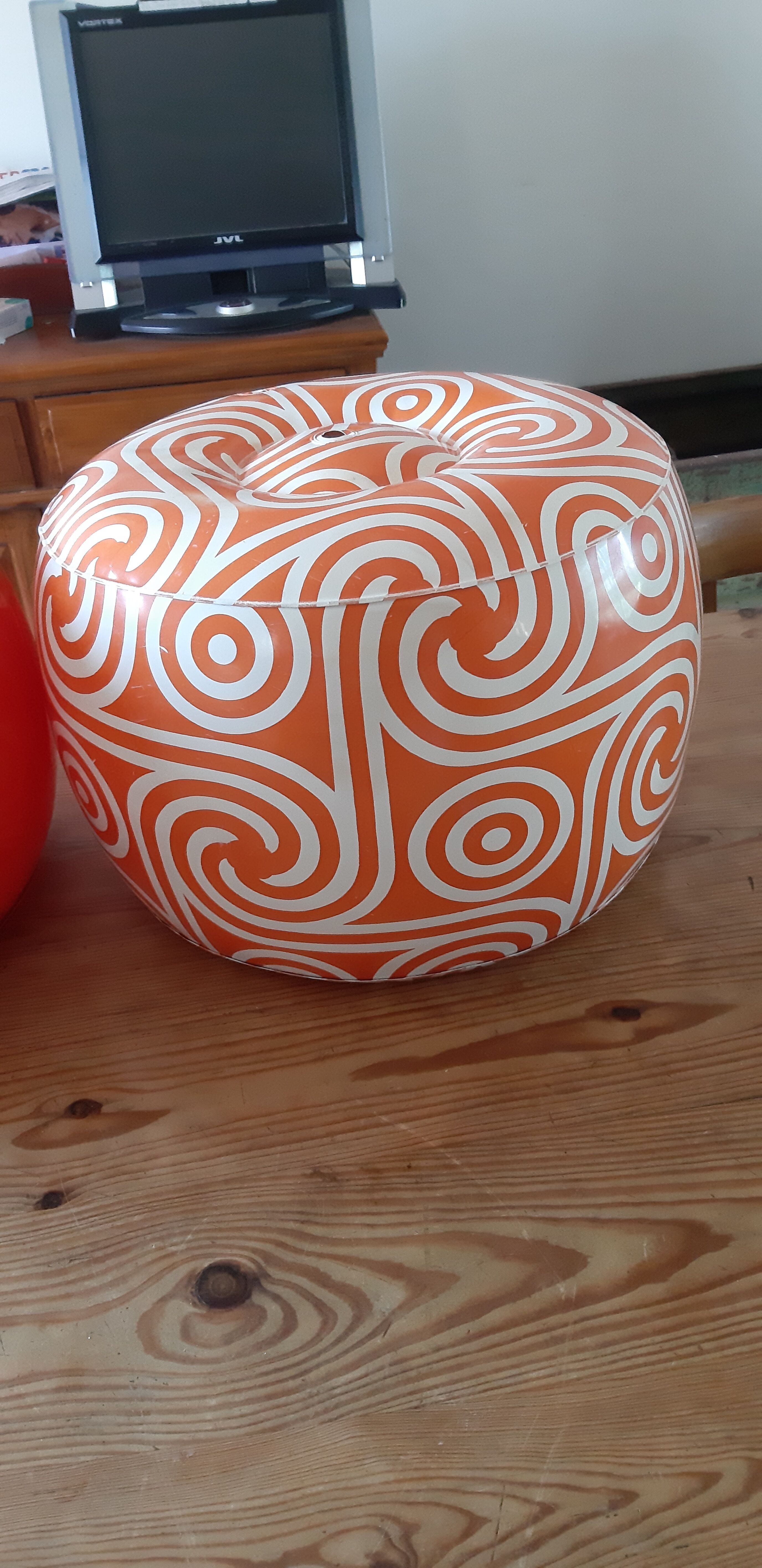 2 vintage inflatable poufs in orange plastic