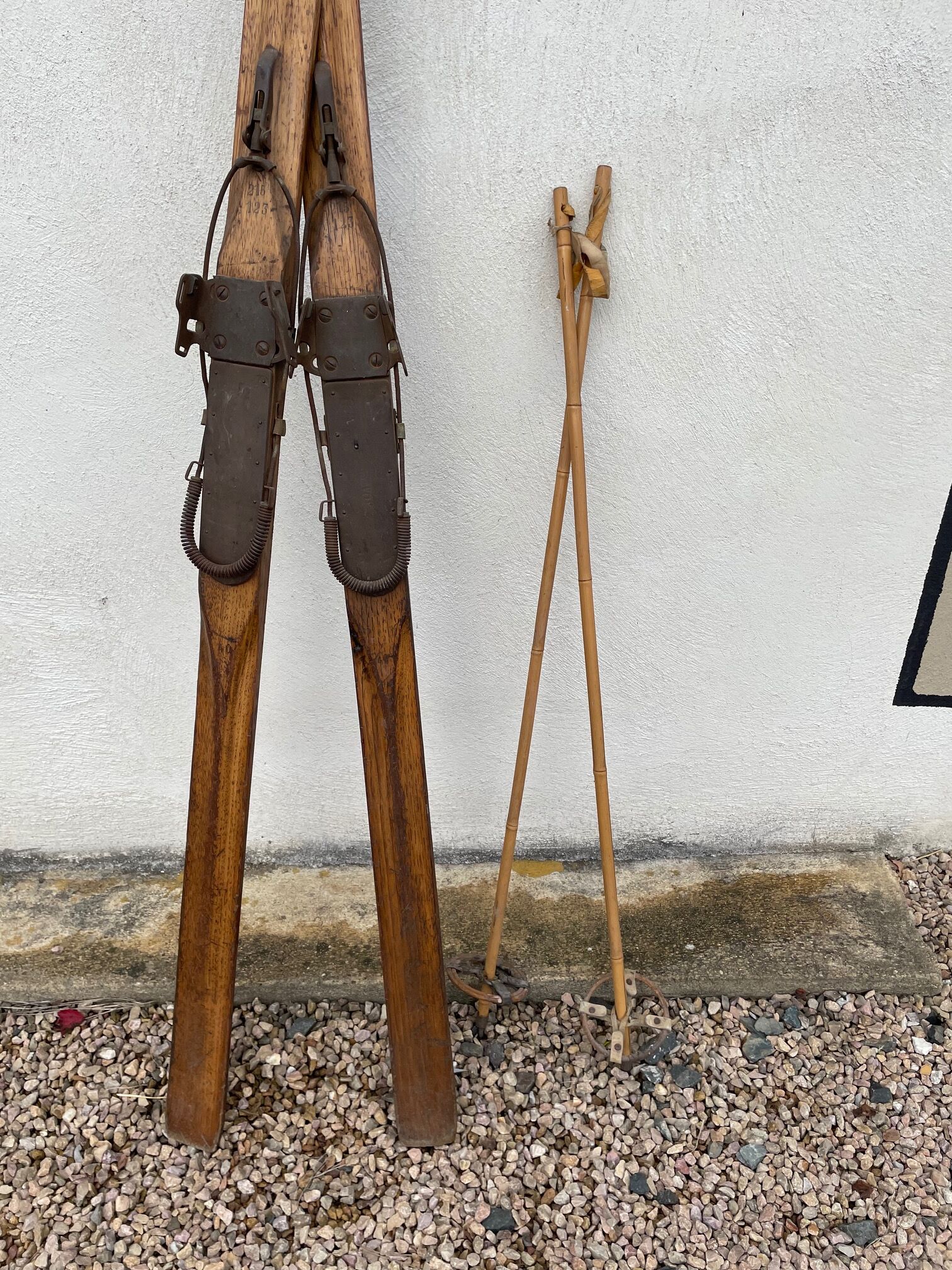 Wooden ski and its sticks