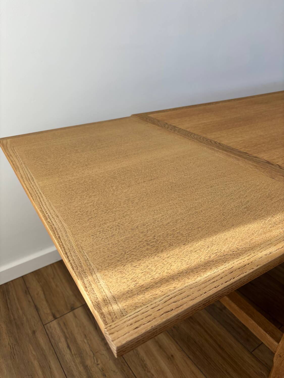 Solid oak farmhouse table with extensions.