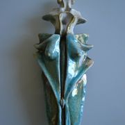 Surreal ceramic sculpture in relief signed to be identified.