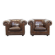 2 Chesterfield armchairs in dark brown cowhide