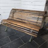 Old cast iron garden bench with oak slats