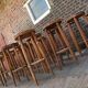 Lot de 30 tabourets pieds compas hêtre Baumann