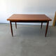 Rectangular extendable dining table with Scandinavian design in teak.