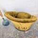 Buttoned frog armchair