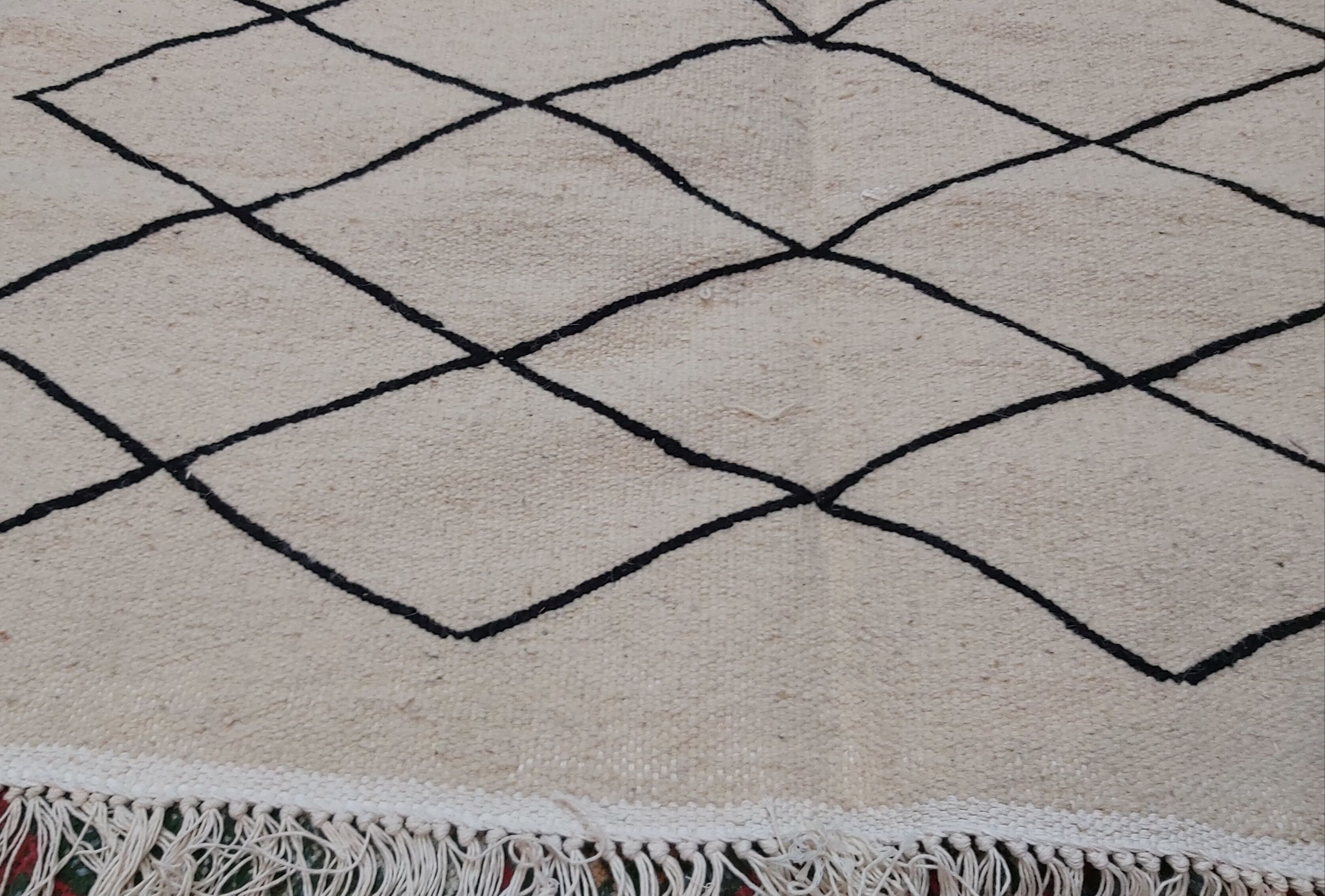 Handmade moroccan beige and black wool rug 192x118cm