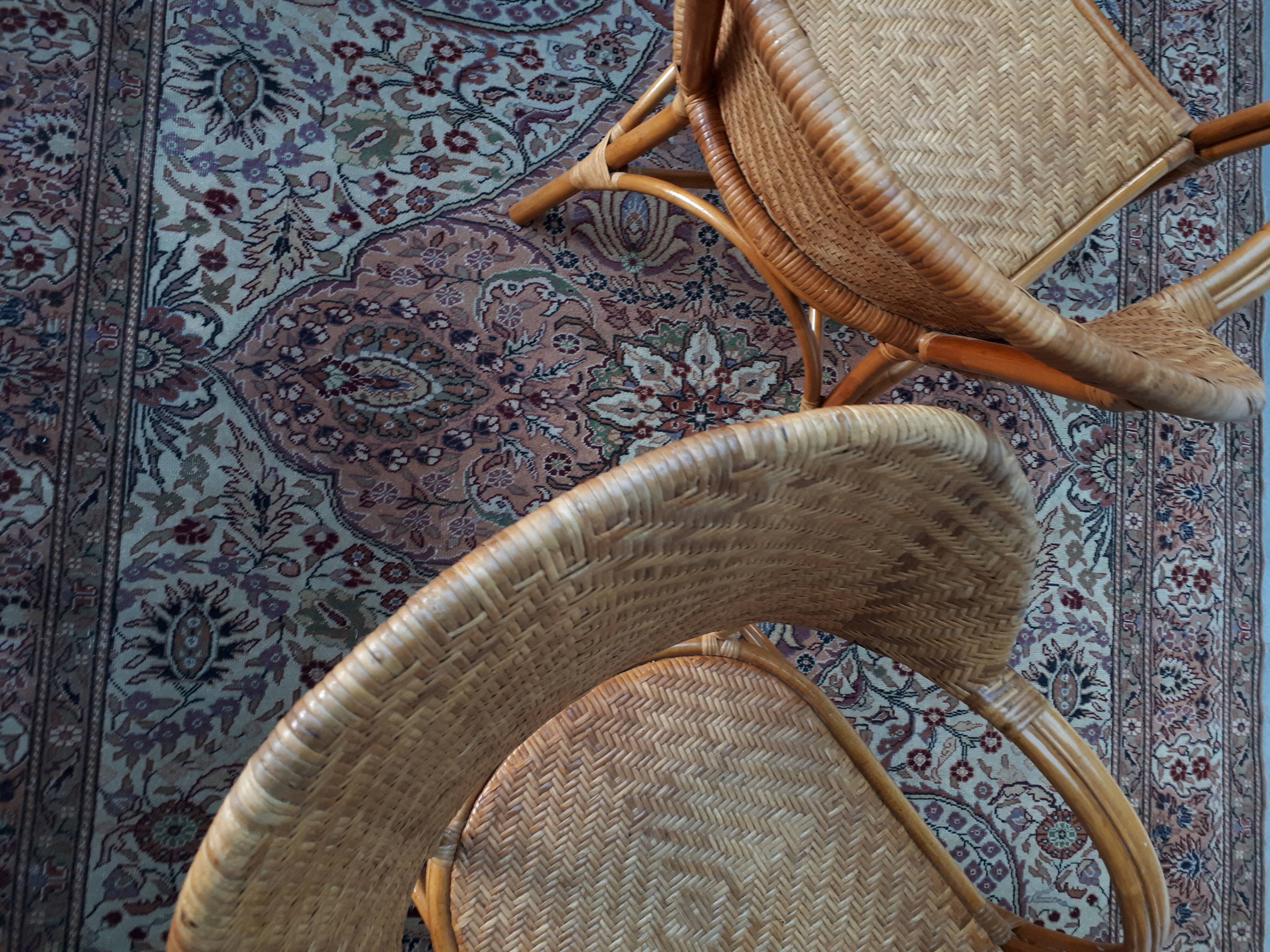 Pair of armchairs in braided rattan 70s