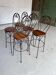 High chairs in rosewood and wrought iron