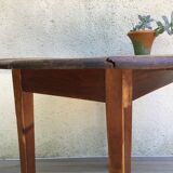 Round table at 2 vintage wood rabats