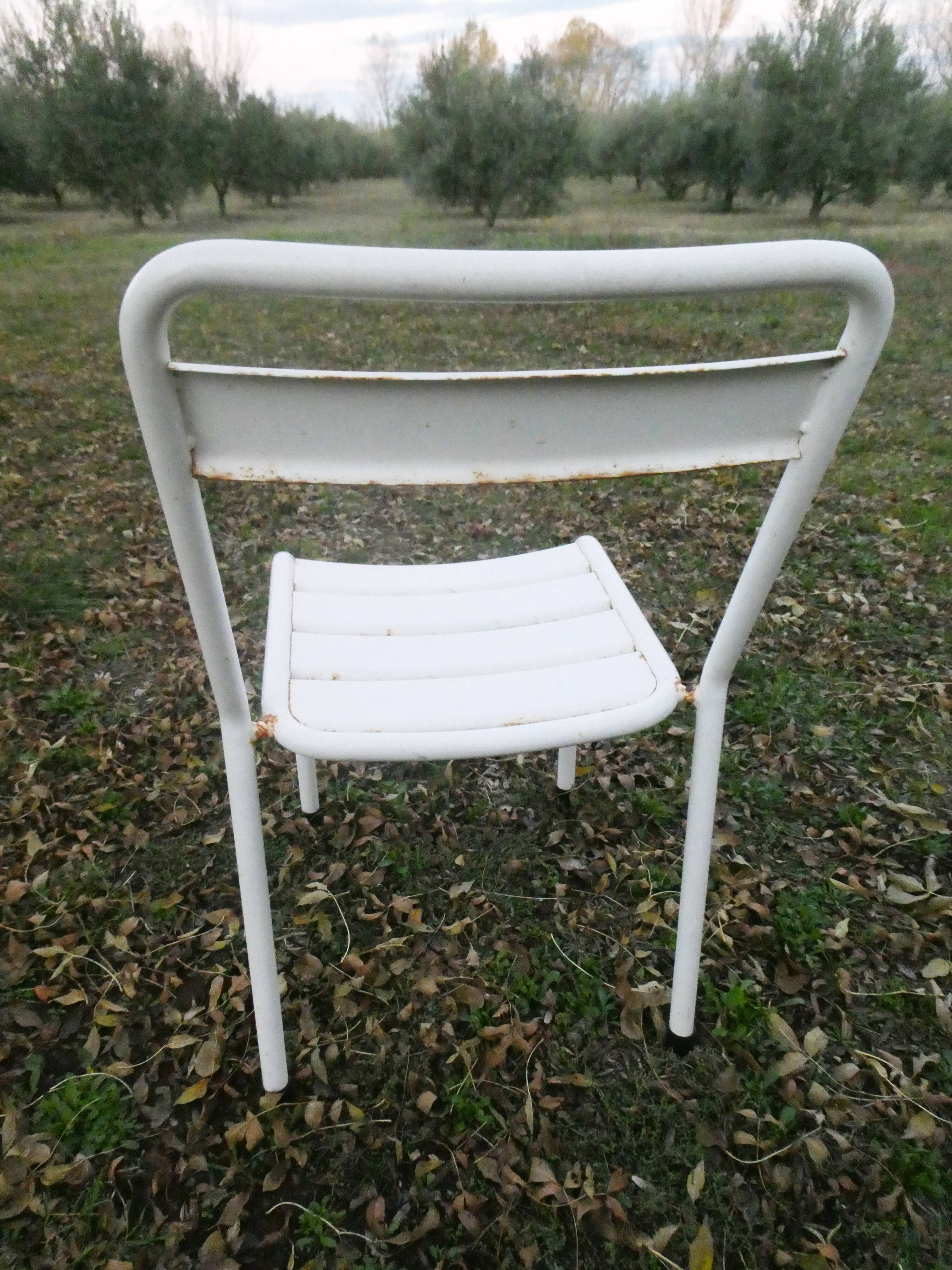 Duo of bistro style indus terrace chairs