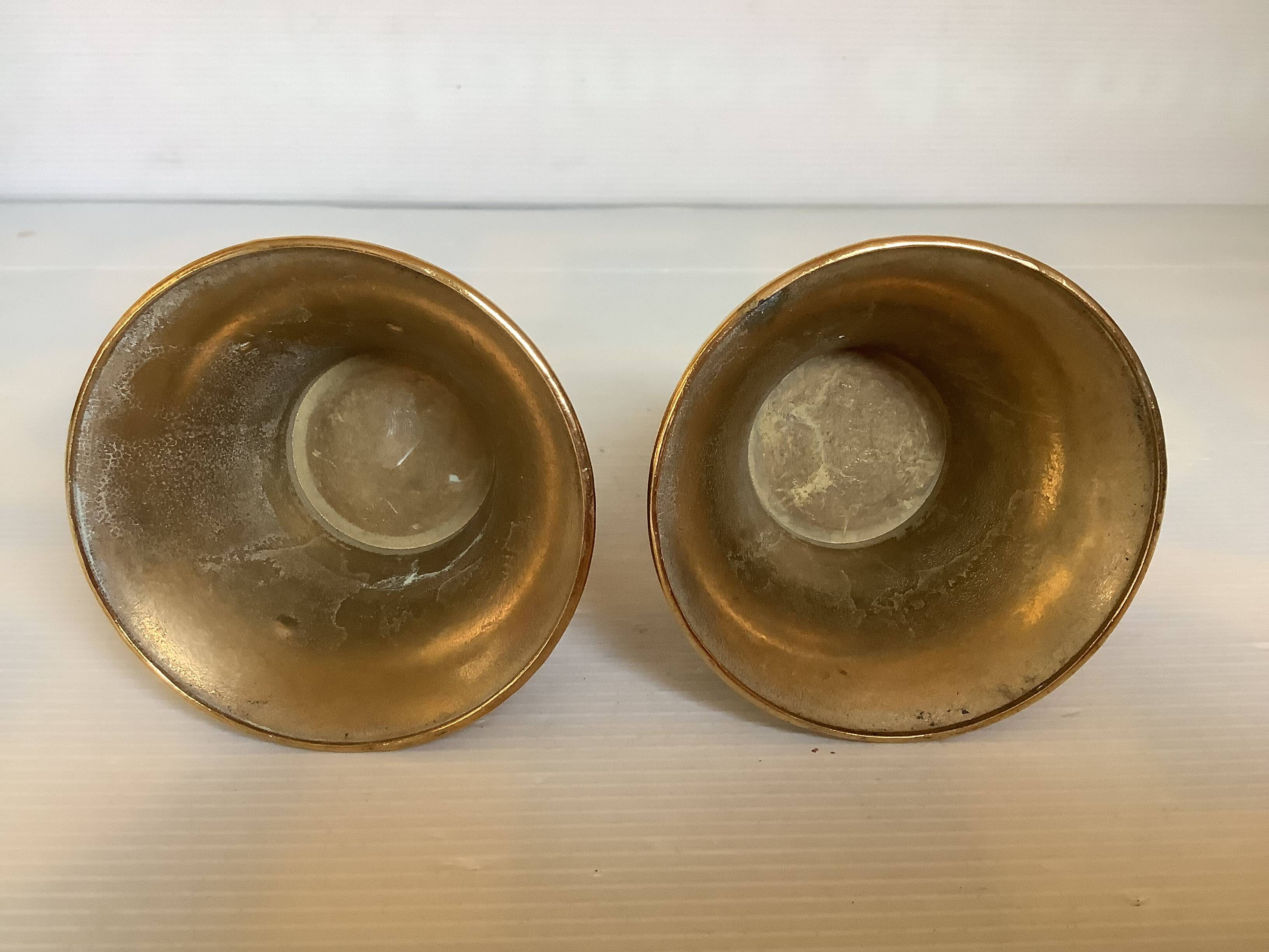 Pair of bronze candlesticks with tulip base
