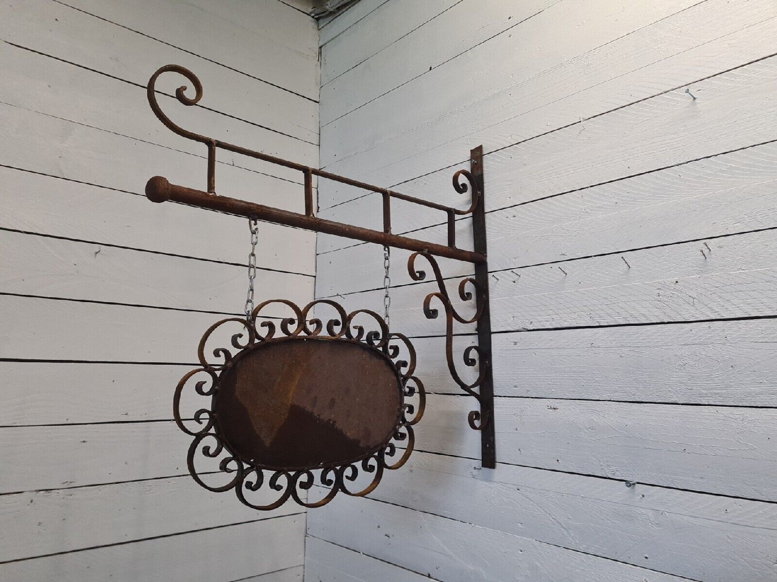 Wrought iron trade sign