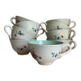 Set of 9 floral Luneville porcelain coffee cups with gold edges