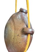 Old stoneware flask known as a toad from the 19th century.