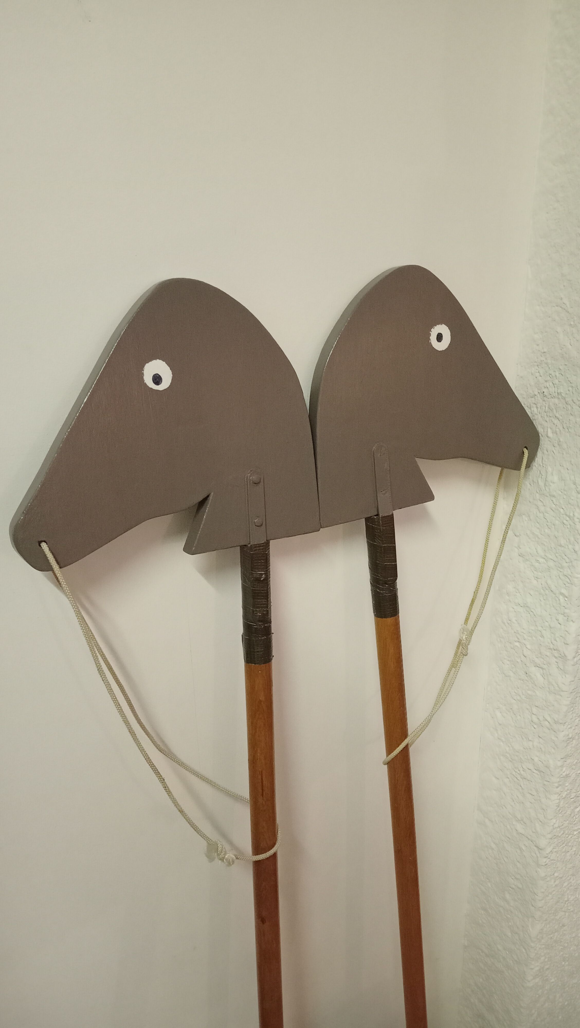 Wooden horses stick on wheels