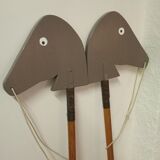 Wooden horses stick on wheels