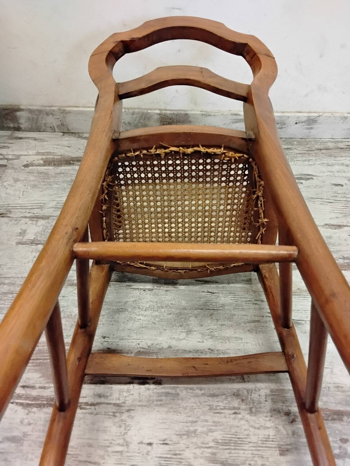 Children's high chair in wood and cane