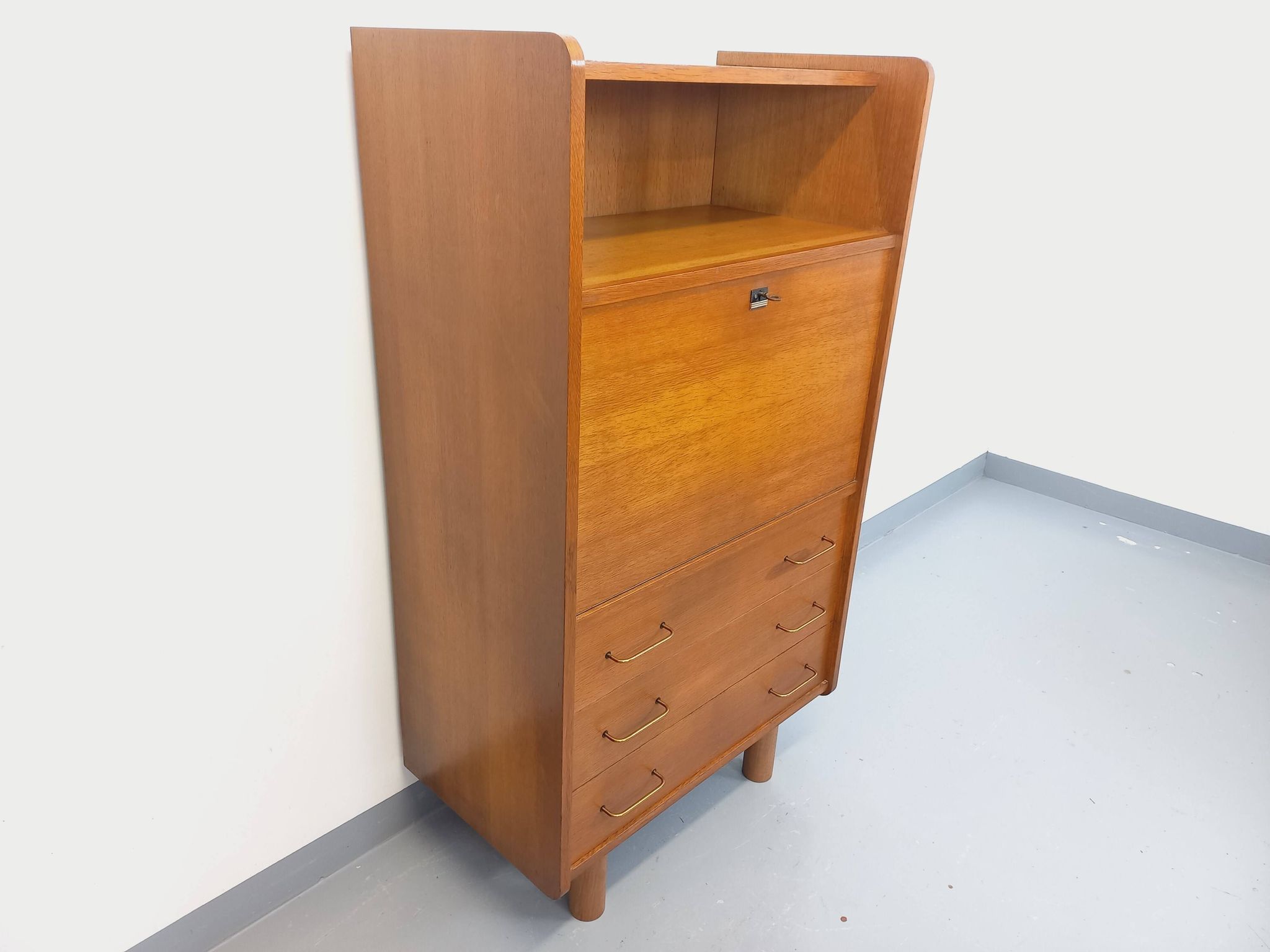 Vintage oak secretary storage furniture from the 1950s and 60s.
