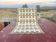 Moroccan Berber rug in cream and camel 250x200 cm – geometric patterns