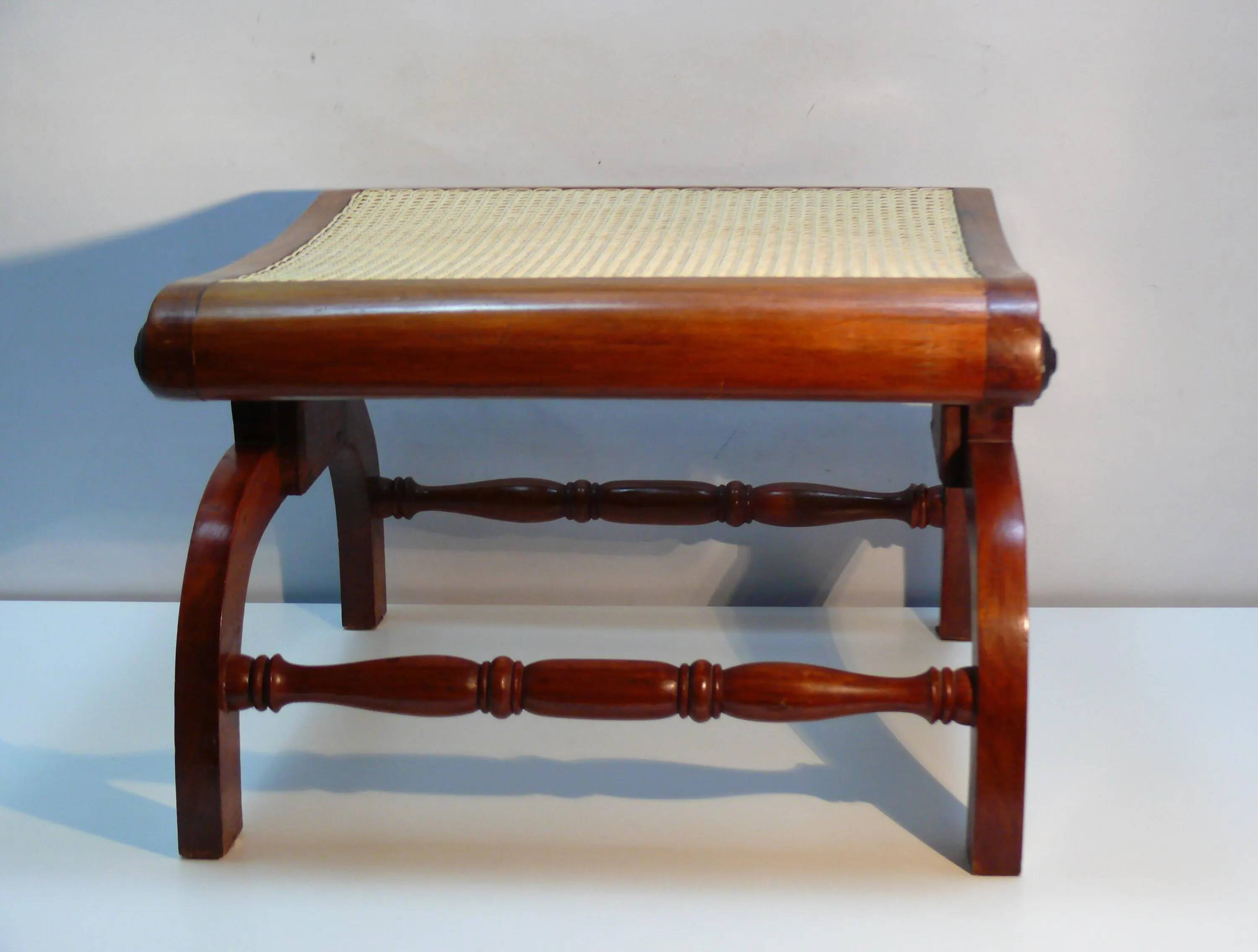 English colonial style ottoman, solid teak, with Viennese cane seat, mid-20th century.
