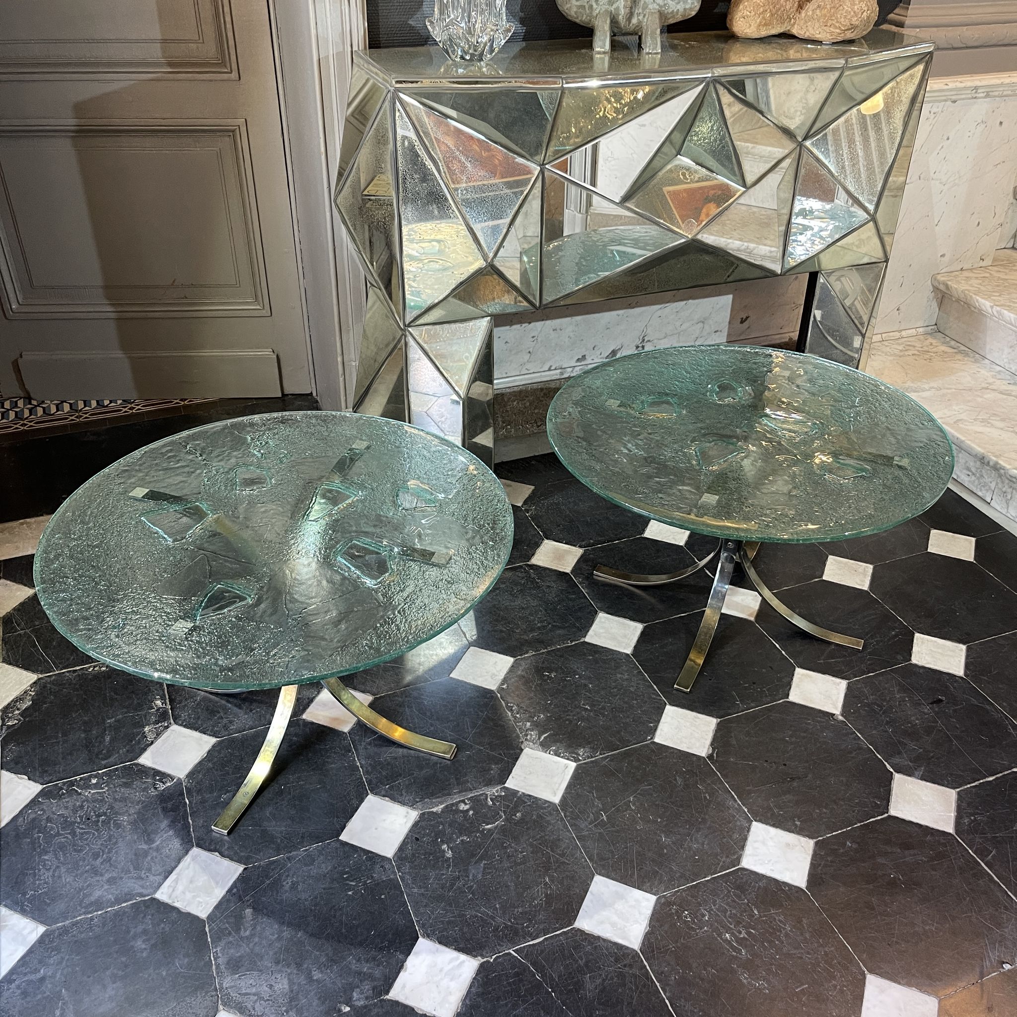 Pair of round coffee tables, glass, ca 1970