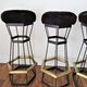 Five brass bar stools and vintage black metal 80s