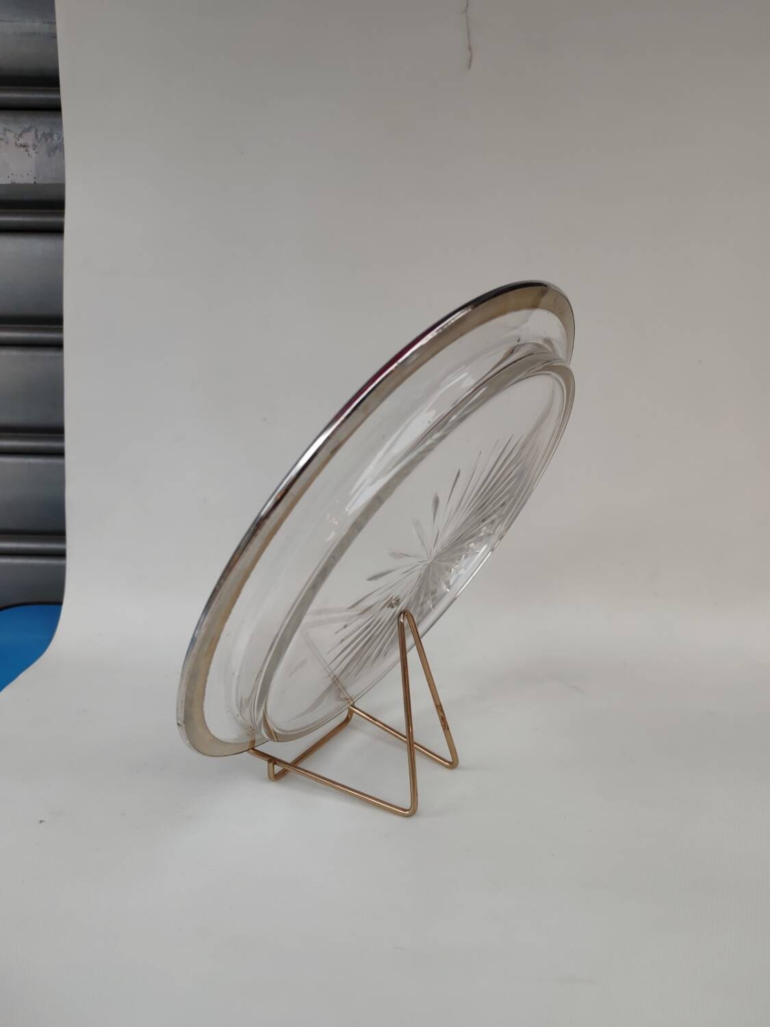 Cut crystal tray and solid silver rim.