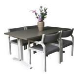 Dining table set and 4 dining chairs by Pierre Mennen for Pastoe.