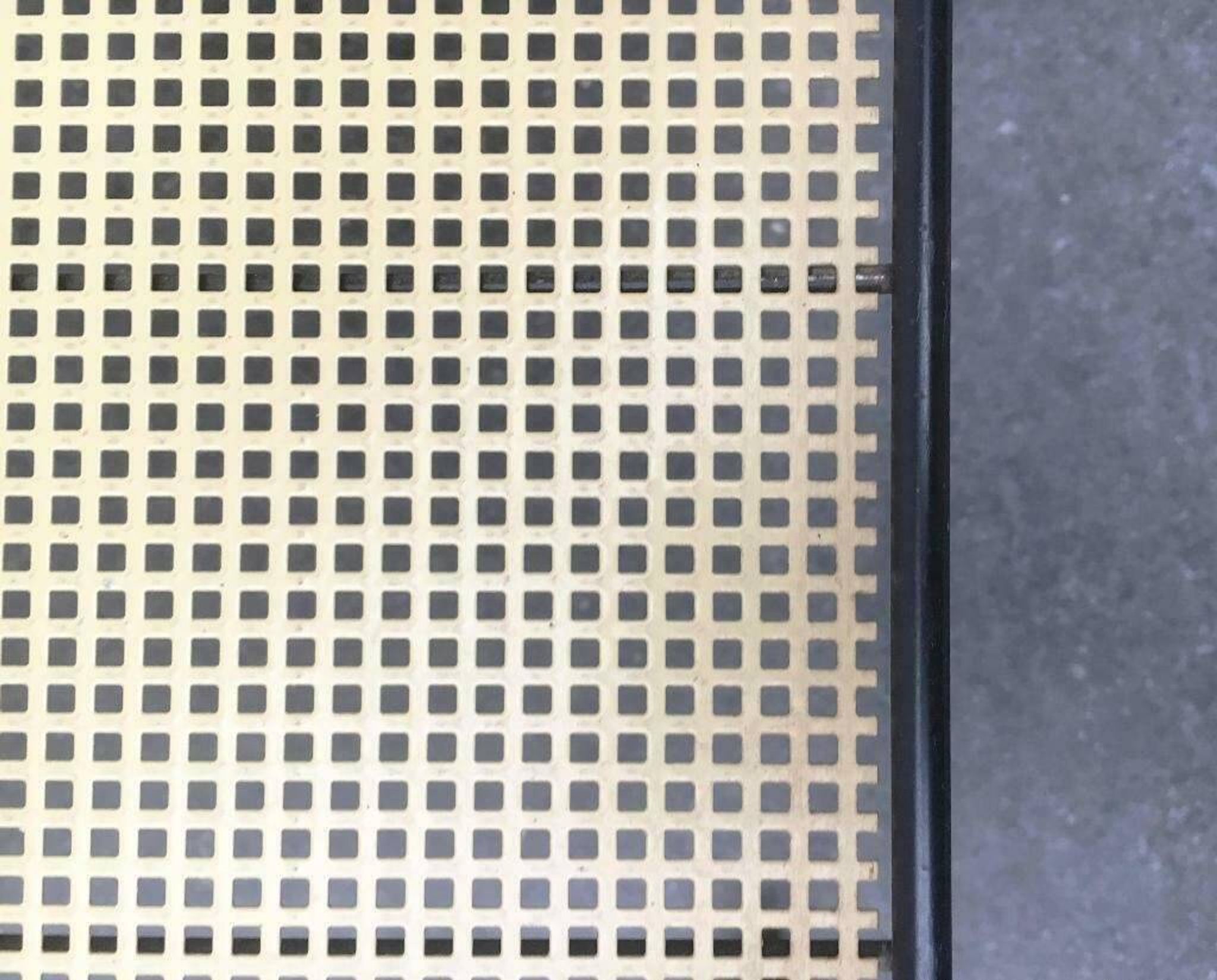 Minimalist perforated metal serving trolley in mid-century style, 1960s.