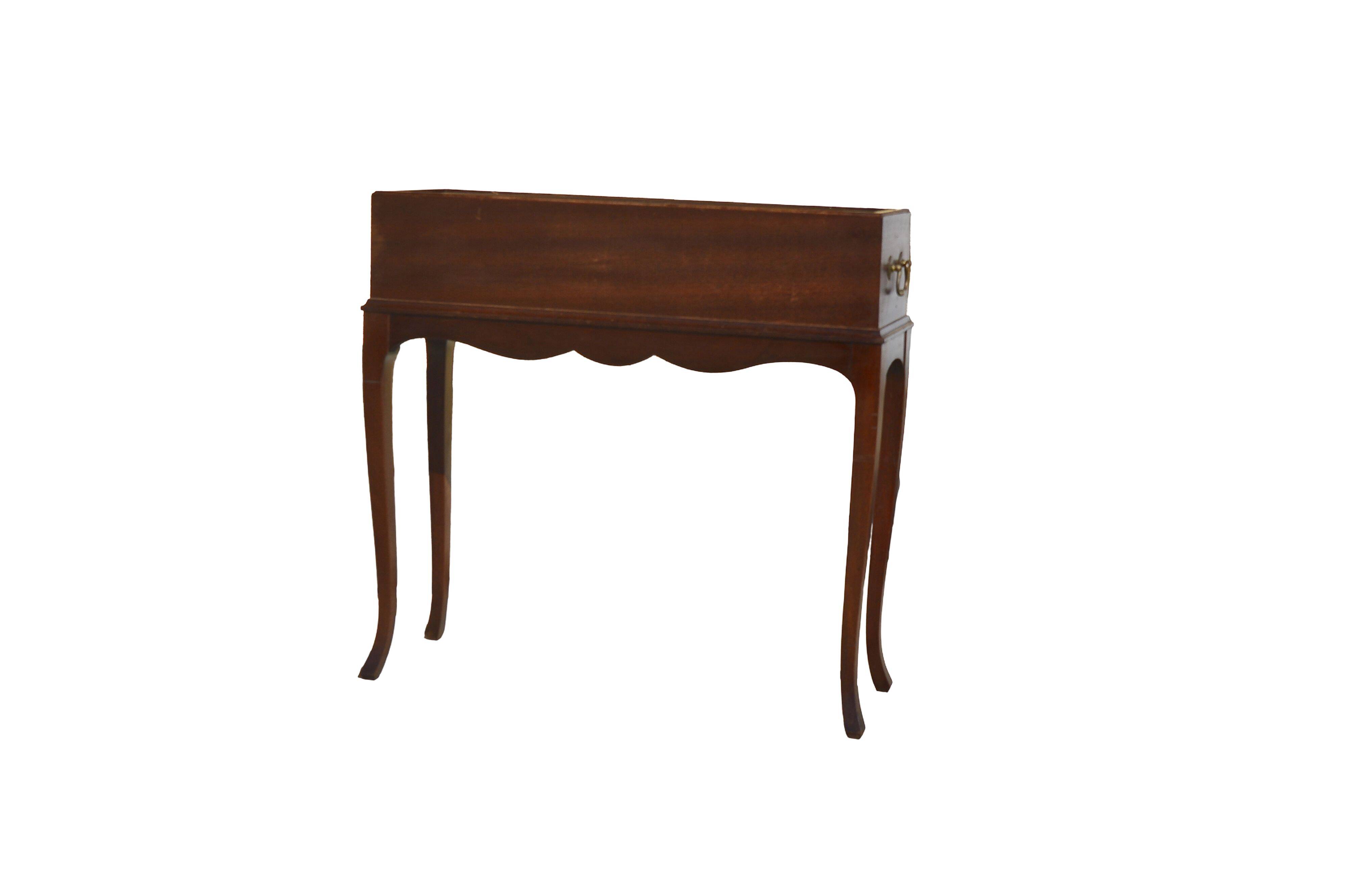 Elegant mid-century teak planter with tray.