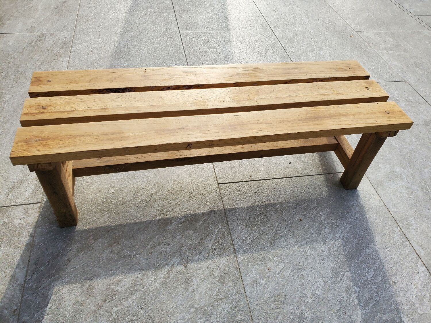 Small bench in raw oak