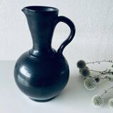 Black glazed stoneware pitcher