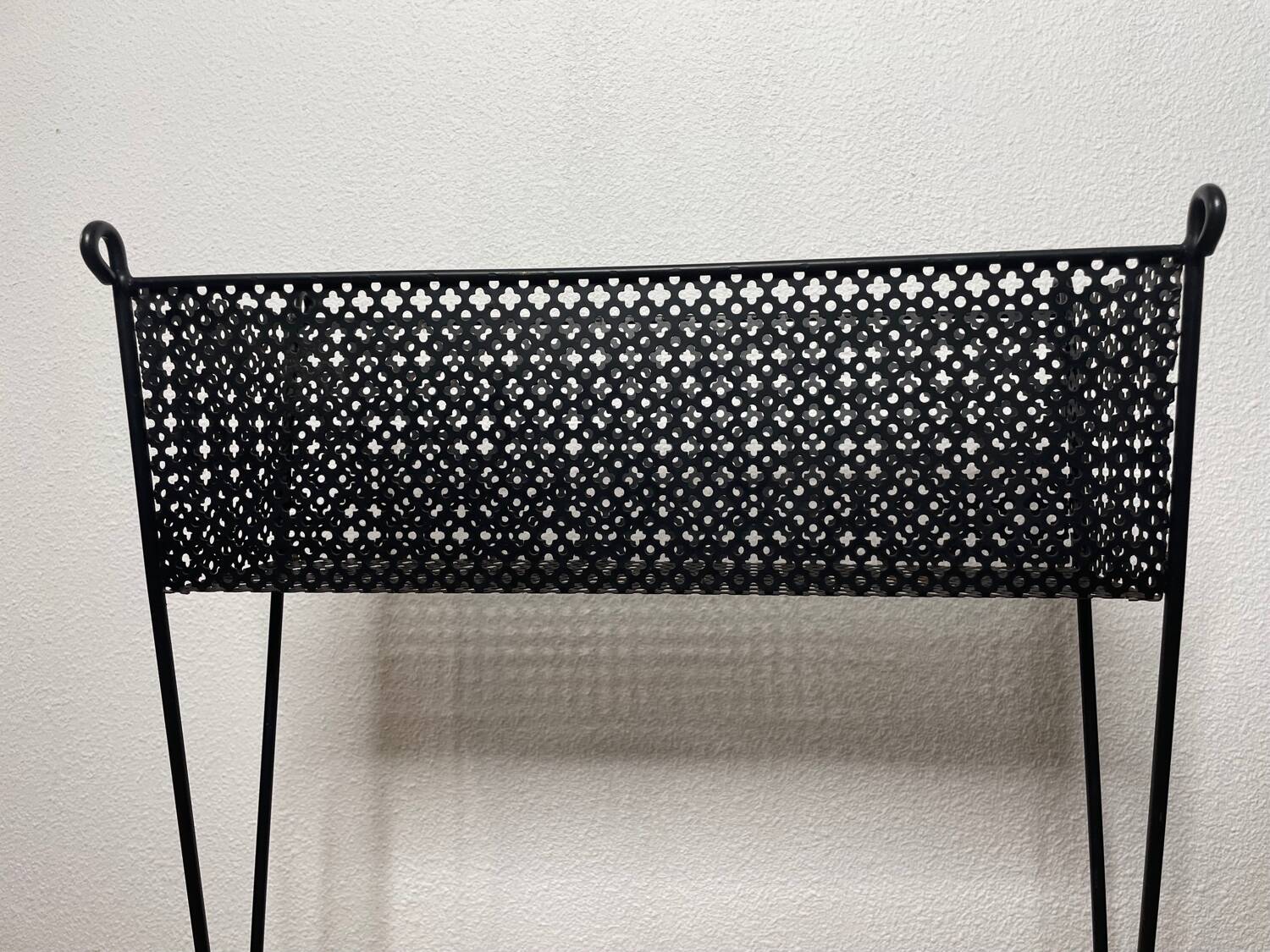 1950s black perforated metal planter in the style of Mathieu MATEGOT