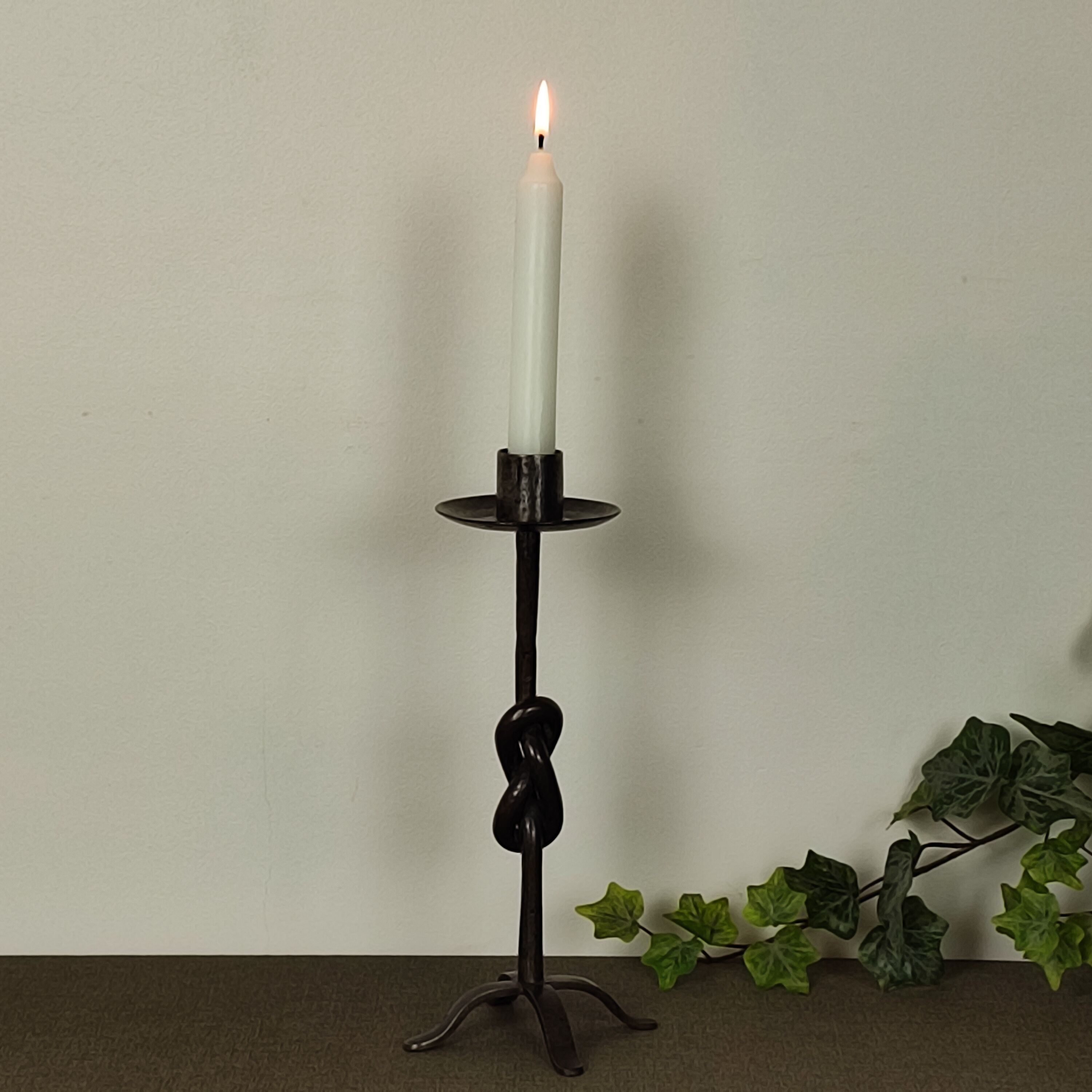 Wrought iron candle holder
