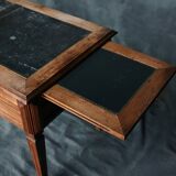 Antique wooden desk with upholstered top and 5 drawers