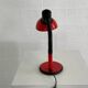 Red aluminum desk lamp from the 70s