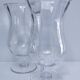 Pair of tall clear glass candlesticks from the early 20th century