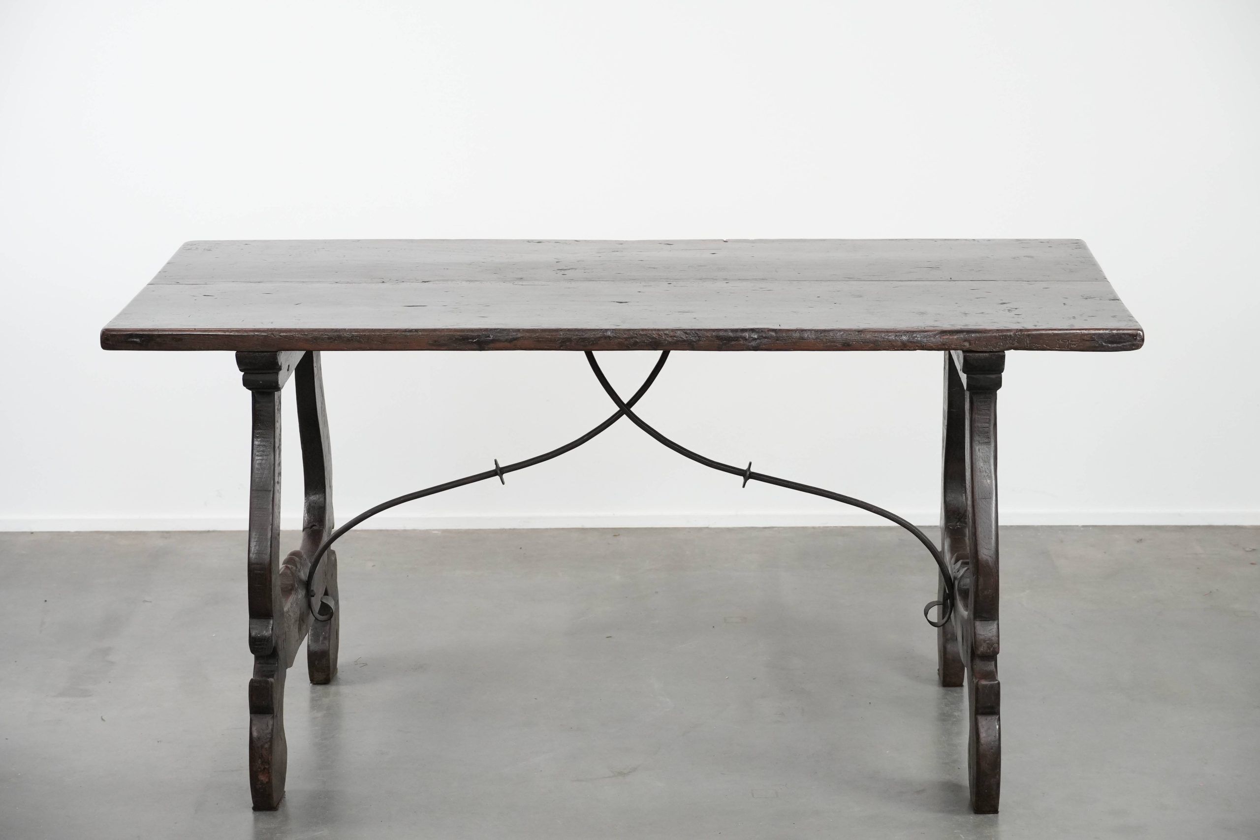 Antique Spanish table from the early 18th century with  a cast iron base