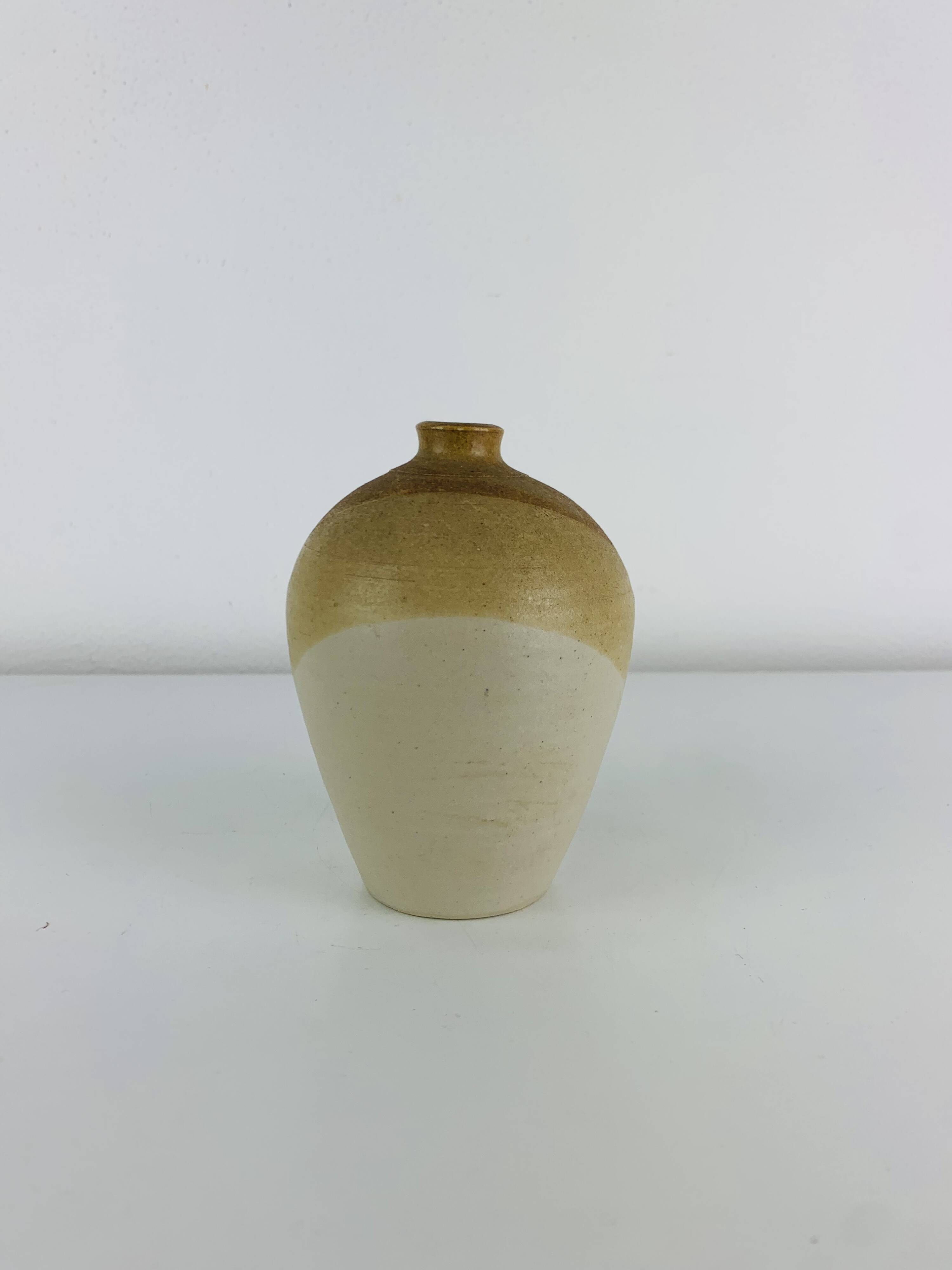 Stoneware vase with organic colours