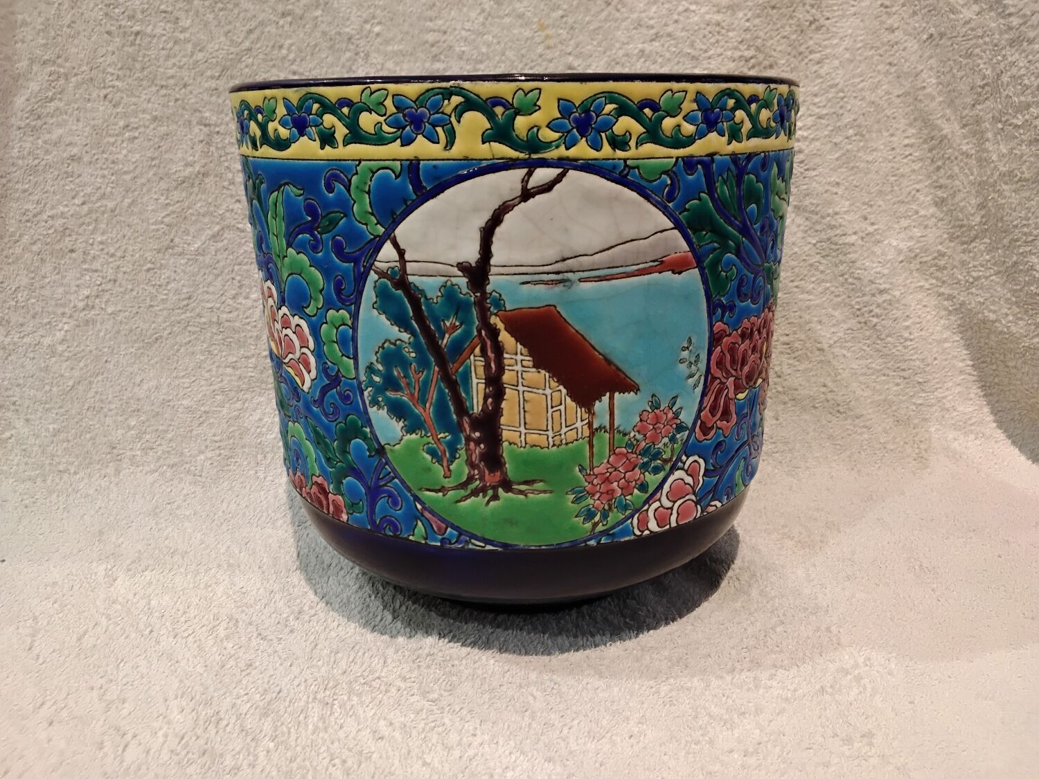 Beautiful large Longwy enamel cachepot with a cabin and chrysanthemum cartouche