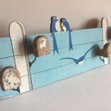 Coat rack with vintage swallows