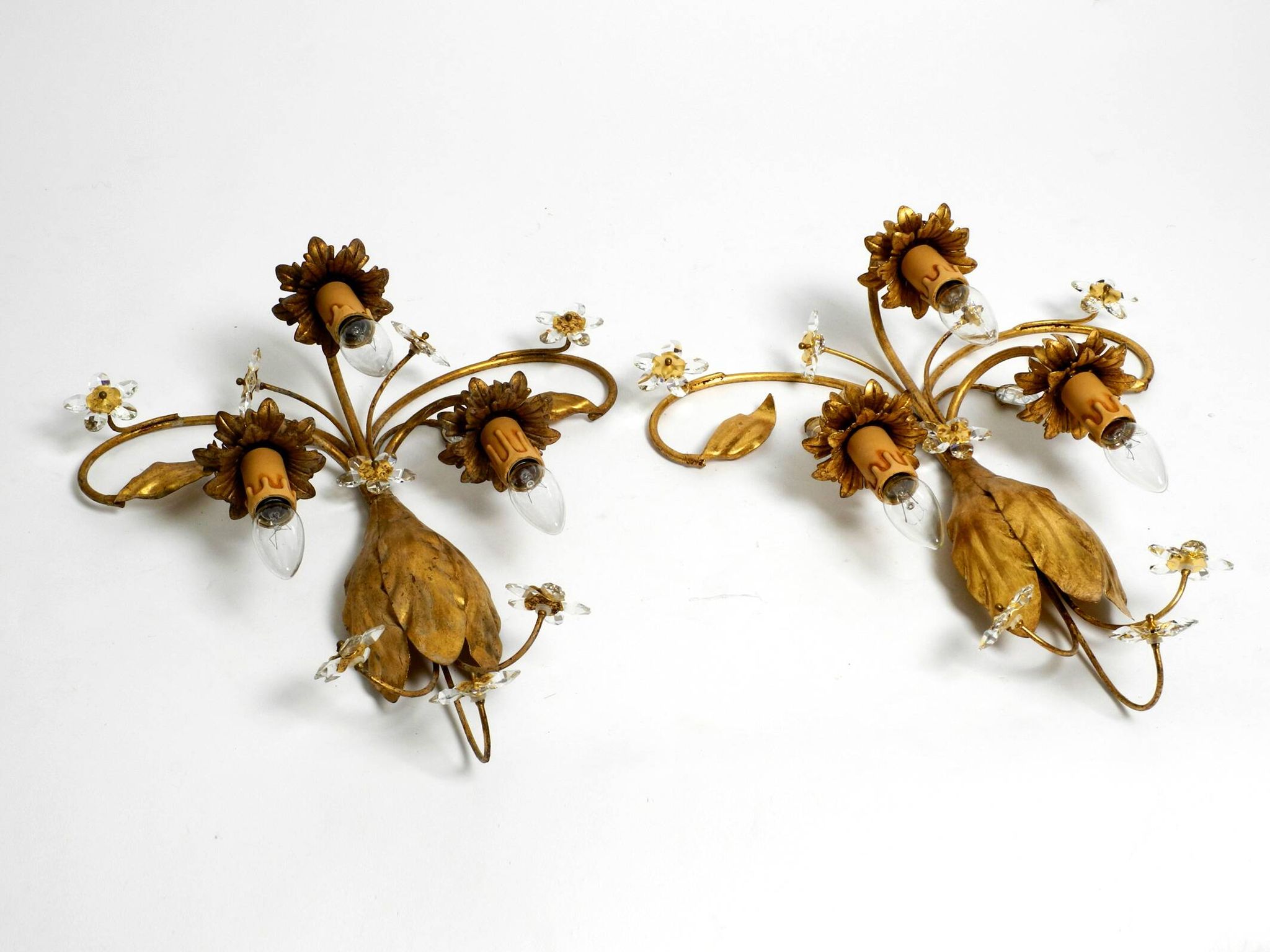 Pair of gold plated Italian 1980's floral Regency Murano glass sconces