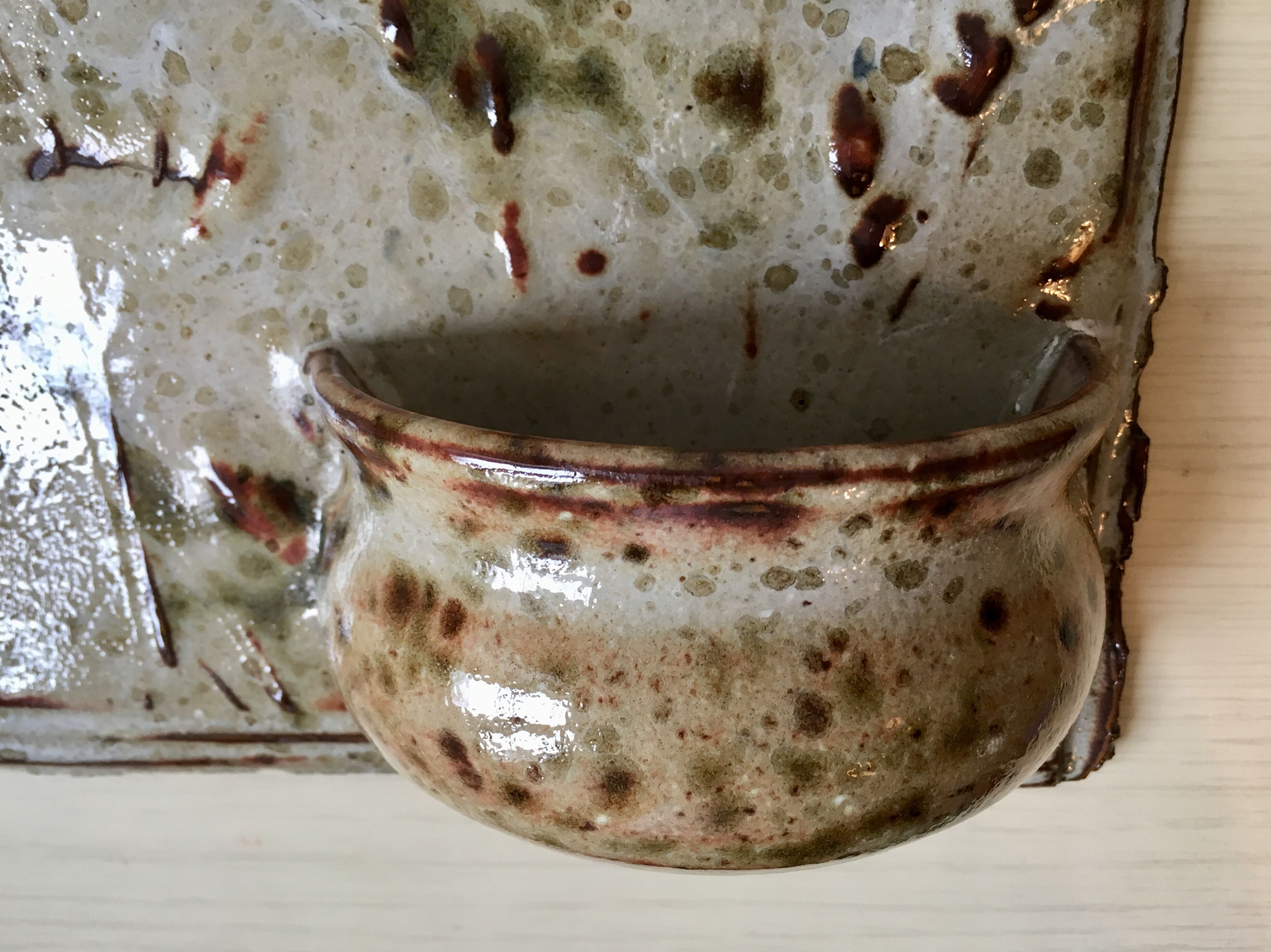 Enamelled sandstone wall flower pot