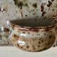 Enamelled sandstone wall flower pot