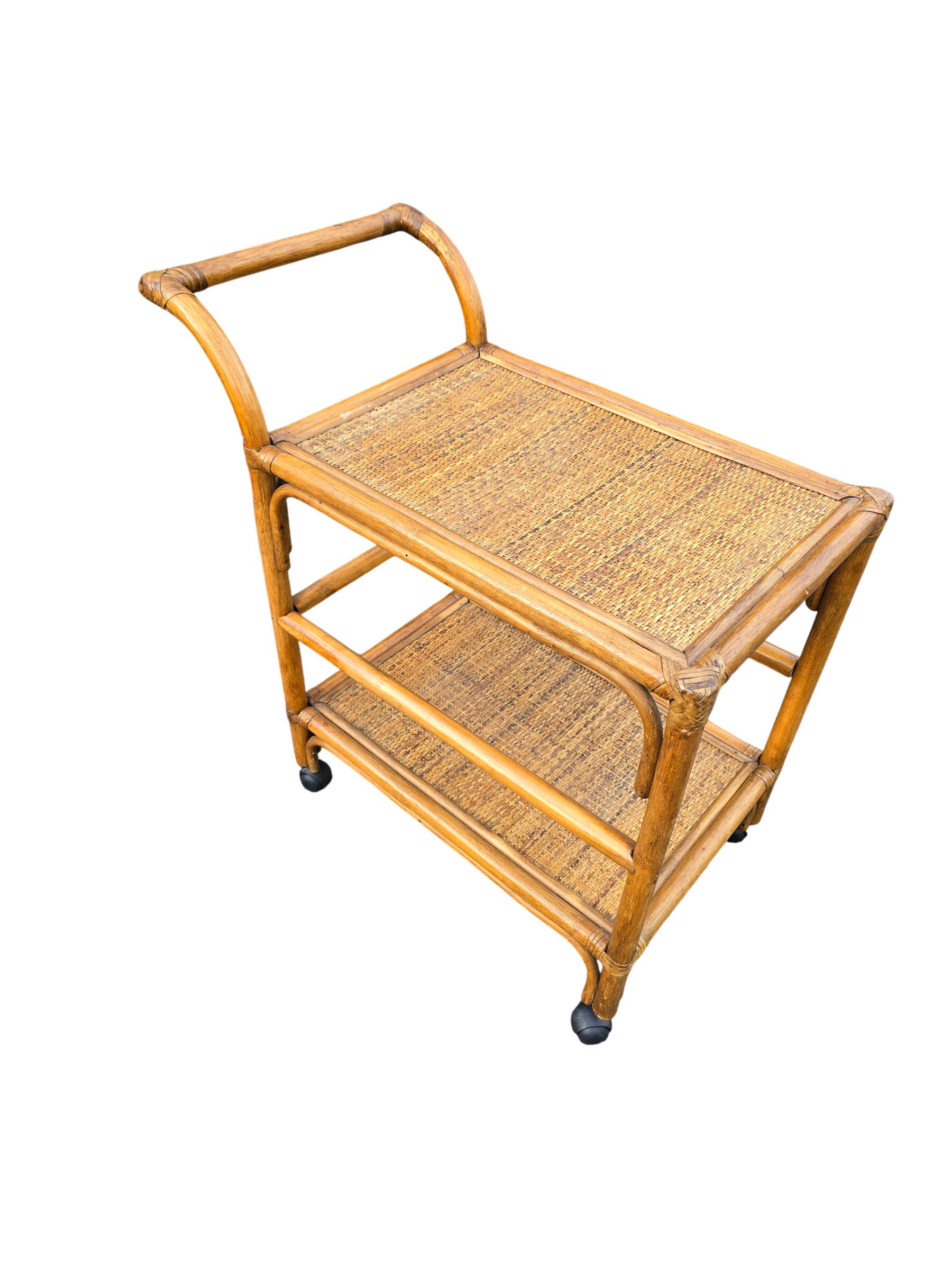 Vintage rolling dessert trolley in rattan and cane from the 60s/70s.